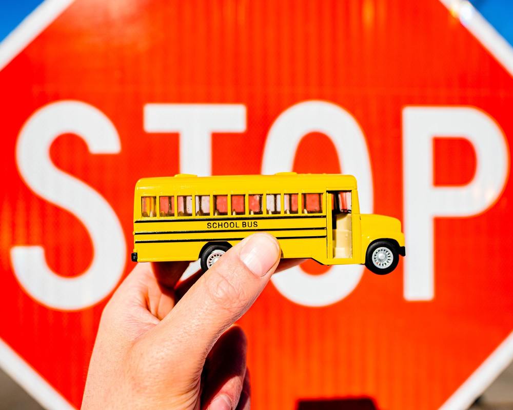 School bus in front of stop sign