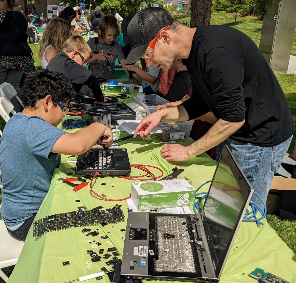 Kids deconstructing computers